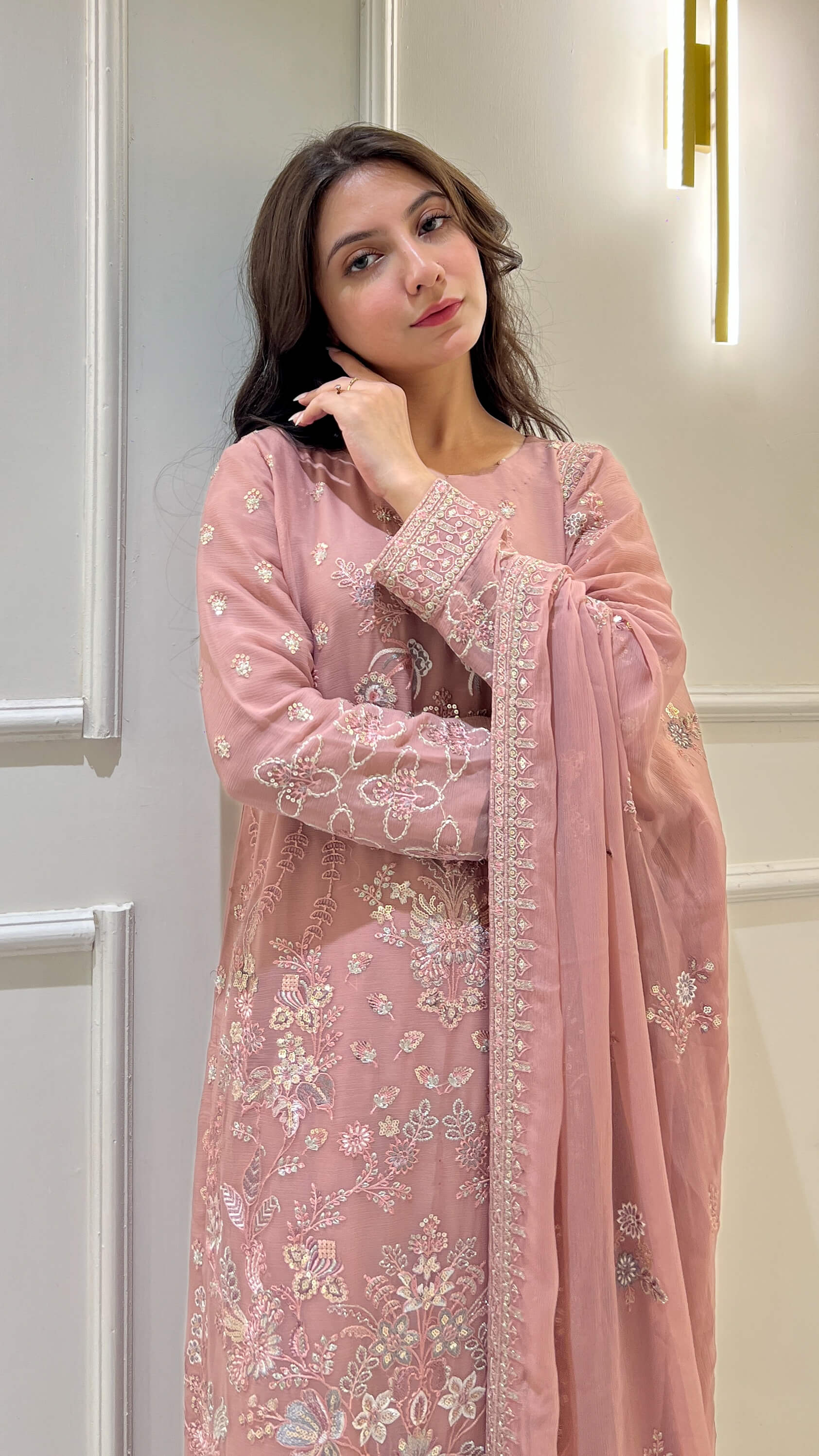 Close-up of floral embroidery on tea pink  shirt and dupatta
