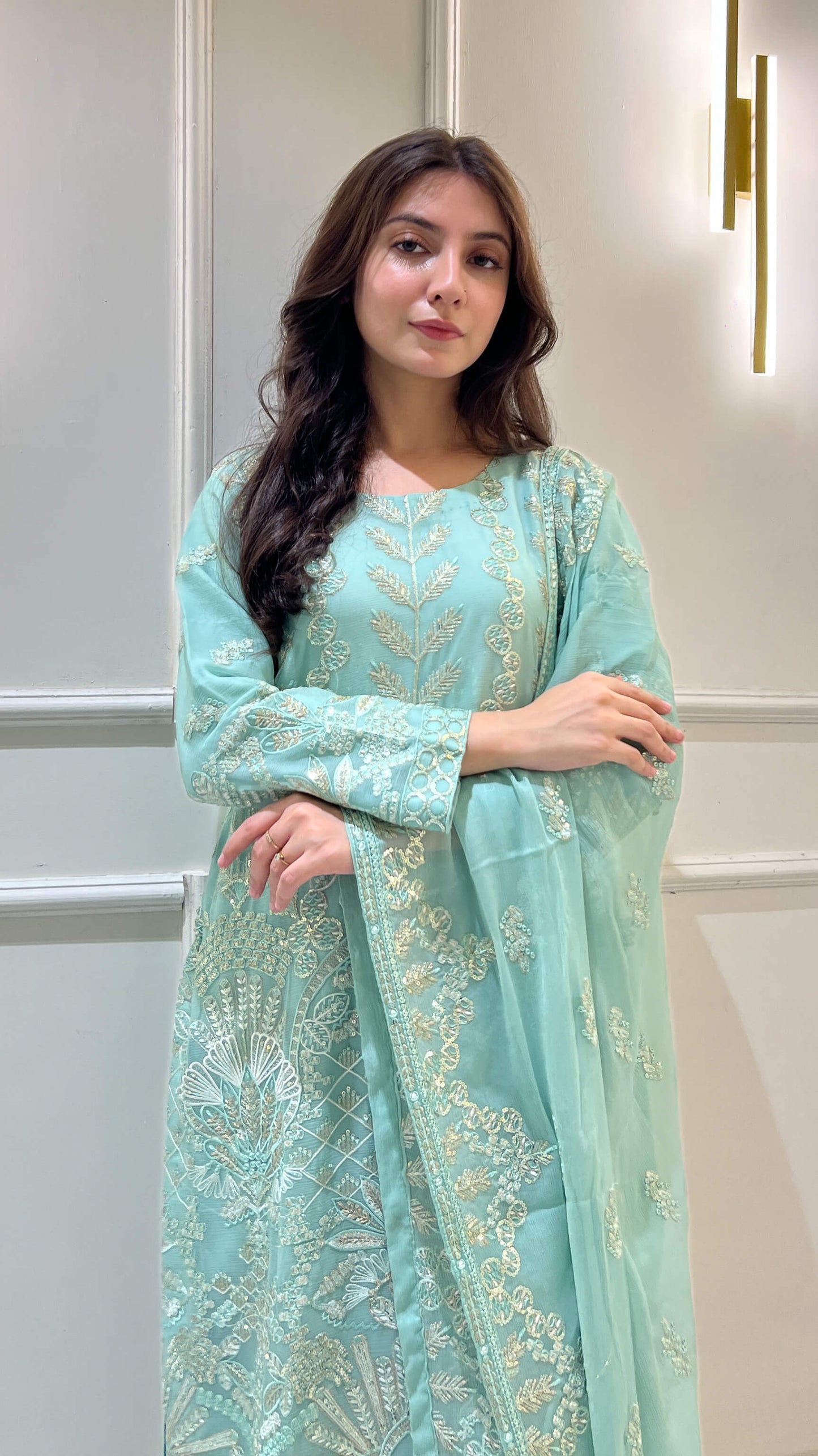 Embroidery detail on light blue chiffon shirt and dupatta